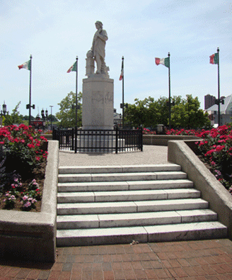 Columbus Piazza Monument Image with Italian Flags & Lovely Flowers on President Street Baltimore MD