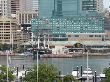 Baltimore's Inner Harbor close up view taken from Federal Hill showing the USS Constellation, Pratt Street Pavilion and yachts at Inner Harbor Marina