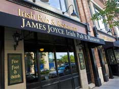 Attractive, authentic storefront of James Joyce Irish Pub and Restaurant on President Street in Harbor East Baltimore Maryland
