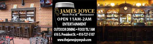 Images of James Joyce traditional Irish Pub &amp; Restaurant dining room with fireplace &amp; authentic Irish bar which were designed and built in Ireland, shipped to the US &amp; reassembled in Harbor East  Baltimore MD