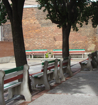 Outdoor Bocce Ball Court with Colorful Benches Painted Italian Flag Colors on Stiles Street Little Italy Baltimore MD