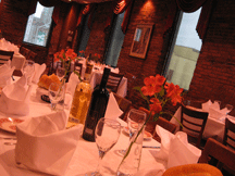 Chiapparelli's Italian Restaurant Private Dining Room Image with Wine Bottles and Fresh Flowers Little Italy Baltimore MD 