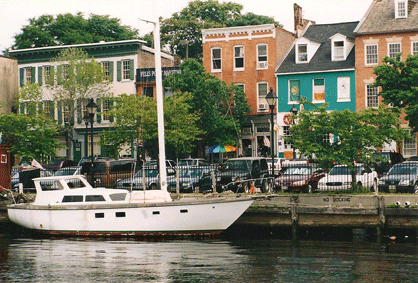 Fell's Point Thames Street Waterfront Showing Historic Buildings and a Docked Sailboat Baltimore MD