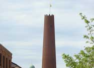Image of old Baltimore Shot Tower, originally known as the Phoenix Shot, 234 foot red brick tower built in 1828 located on Fayette Street near President Street in historic Jonestown just north of little Italy, Baltimore, MD